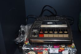 A vintage tape cassette player by Superscope