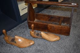 A vintage pine tool or garden carry case with a pair of shoe last