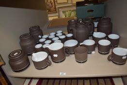A selection of kitchen and table wares by Hornsea Pottery in the Contrast pattern