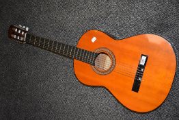 An acoustic guitar bearing label for Concerter