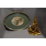 A wooden carved wall scone with gilt finish and a wooden dinner tray