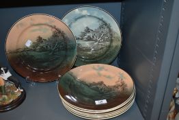 A group of eight Royal Doulton Cottage Ware or Series ware plates, muted colours, printed marks to