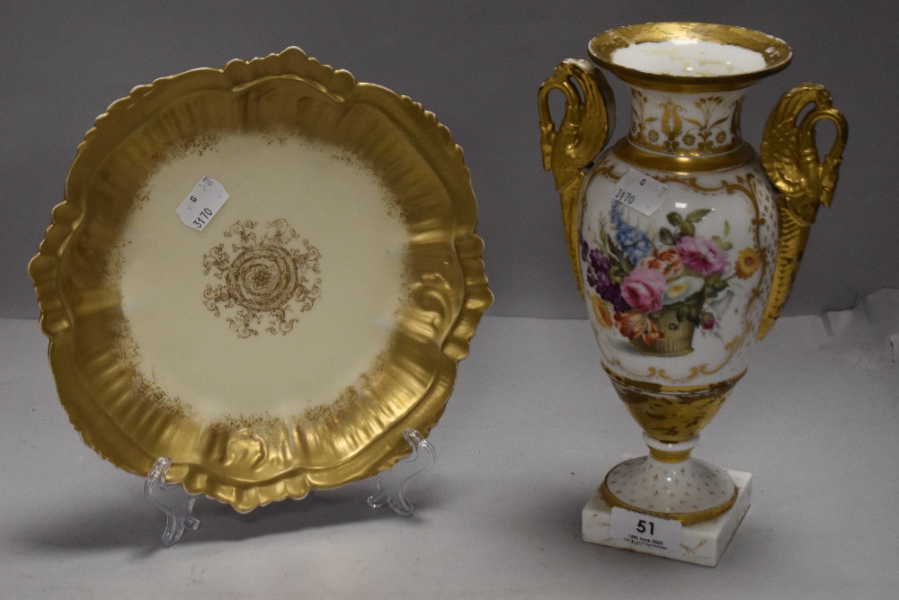 A mid Victorian porcelain mantle vase hand decorated with twin gilt dragon handles and a similar