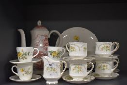 A selection of tea cups and saucers including Paragon Francesca and Wedgwood Golden Glory