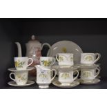 A selection of tea cups and saucers including Paragon Francesca and Wedgwood Golden Glory