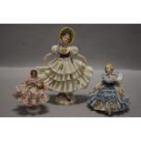 Three 20th century lace work porcelain figures including Frankenthal and Dresden