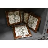 Five Victorian ceramic tiles having a French style design all framed