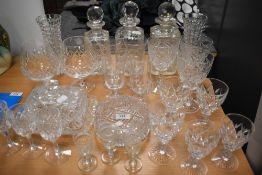 A selection of clear cut crystal glass wares including brandy, wine and cordial