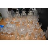 A selection of clear cut crystal glass wares including brandy, wine and cordial