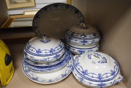 A selection of blue and white ware tureens and charger plates