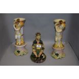 Two Capodimonte mantle vase with cherub design and a similar tramp figure Italian made