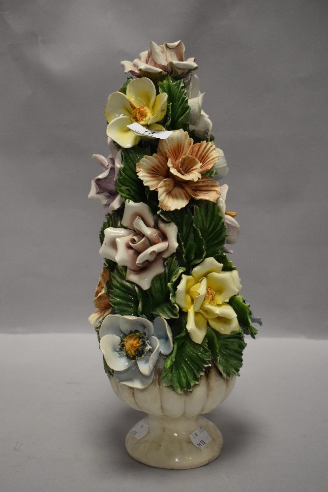 A vintage ceramic flower display by Capodimonte