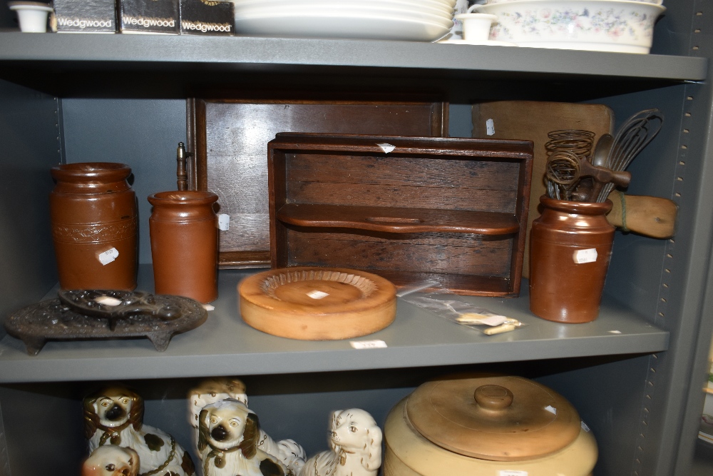 A good selection of vintage kitchen utensils and hardware including cutlery tray and bread board