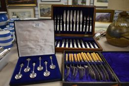 A selection of cased sets of cutlery including mother of pearl handled fruit set and Royal