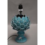 A ceramic table or side lamp in the form of an artichoke having azure blue glaze