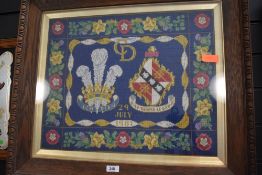 A 20th century embroidery for the marriage of Charles and Dianna in an oak frame
