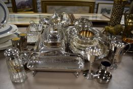 A selection of silver plate dinner and table wares including toast rack, tea pot and serving dishes