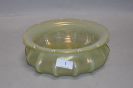 An antique Loetz style glass bowl having scalloped design with iridescent finish