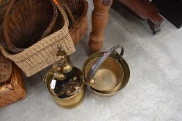 A Victorian brass jam pan and similar toffee pan, together with brass companion set.