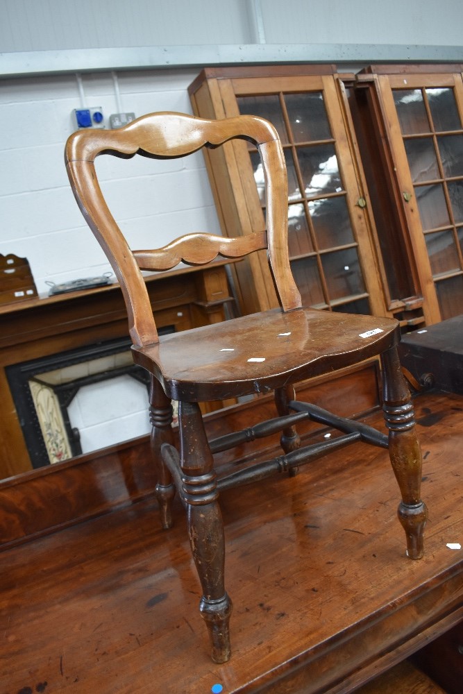 A Victorian stained frame country kitchen chair