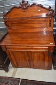 A Victorian mahogany chiffonier, of traditional design, lacking base plinth, on castors.