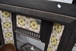 A reproduction cast and tiled fire surround (af)