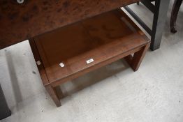 A vintage teak coffee table