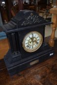 A Victorian black slate mantel clock, manufactured by The Ansonia clock company