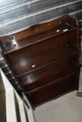 A 1940's oak waterfall bookcase