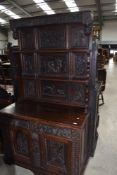 An interesting 19th Century oak sideboard/dresser having carved pictorial panels decoration,