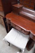A Victorian mahogany dressing table, in the Dutchess styl, lacking mirror and with damages