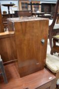 An early 20th Century walnut bedside cabinet