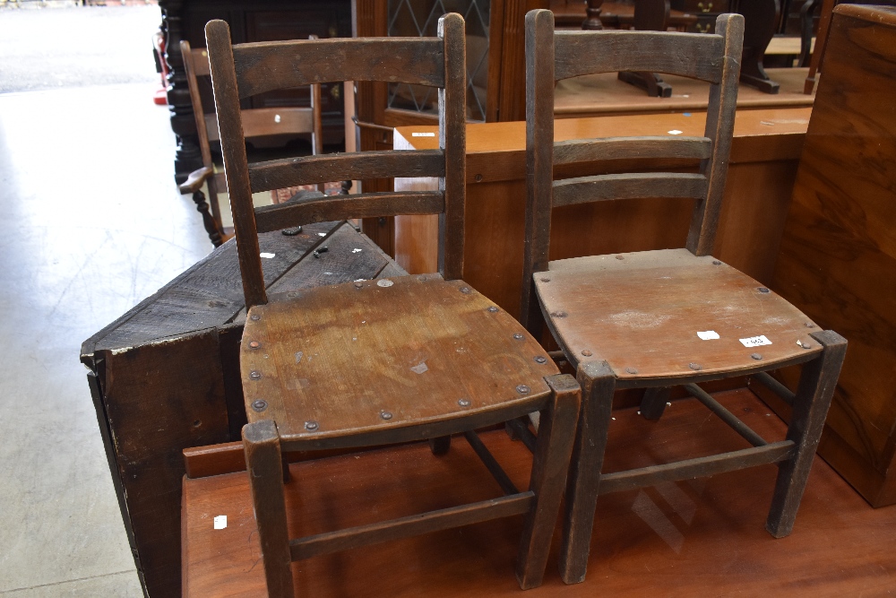 Two early 2oth century children's chairs, oak with ply seats.