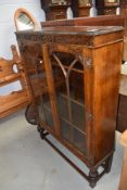 An early 20th Century oak boookcase, width approx. 91cm