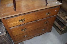 An Edwardian pine chest of three drawers