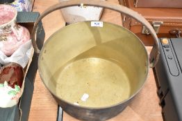 A brass and cast vintage jam pan