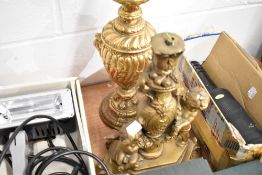 Two cast modern side lamps one as an urn and similar gilt cherub design