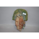 A vintage terracotta Aztec or South American mask representing life and death