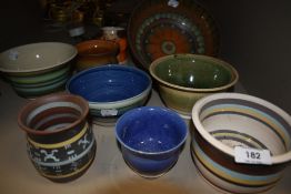 A collection of studio pottery bowls and similar.