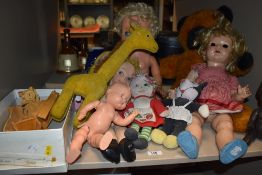 A selection of vintage and retro dolls, teddies and wooden dolls house furniture.