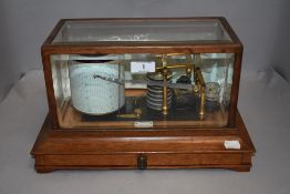 A 20th century barograph weather station oak cased with bevel edged glass by R Atkinson of