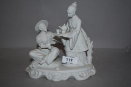 A parian ware figure group of two Chinese figures drinking tea