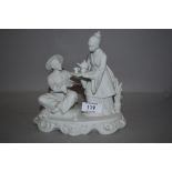 A parian ware figure group of two Chinese figures drinking tea