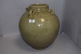 A mid century studio pottery vase by Lakeland potter William Plumtre large form four handle green