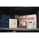 A selection of vintage and modern childrens board games and puzzles including Beatrix Potter