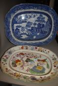 Two antique ceramic charger plates including Masons and a traditional willow ware platter