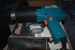 A Black and Decker paint stripper.