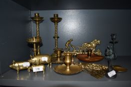 A selection of brass wares including a pair of twist stem candle sticks with key holder and