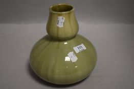 An art deco era studio pottery vase by Wescontree in gourd form with candy glaze