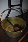 A large brass jam pan and similar sauce pot